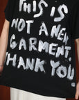 7_THIS IS NOT A NEW GARMENT. THANK YOU.